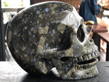 Que Sera (Llianite) Laughing or Singing Skull [17Y63]