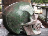 Red and Green Garnet in Matrix Skull [1k1551]
